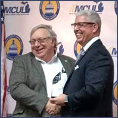 Mike Palumbo Receives Howard Spencer Volunteer Activist Award from MCUL